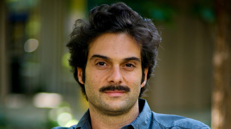 smiling, indian Ethnicity, one Person, head And Shoulders, beard, blue, human Face, casual Clothing, looking At Camera, fashion, daniele luppi, looking