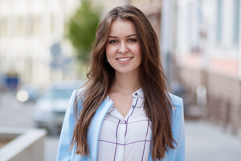 outdoor, white, long hair, young, headshot, casual, lady, hair, adult, cheerful, smile, young adult, cute, looking at camera, 5K, shirt, street, hairstyle