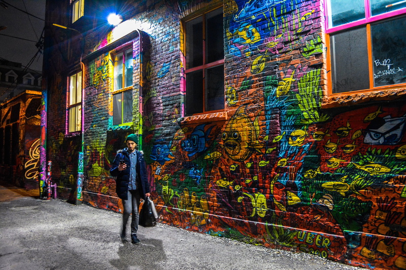 building, built structure, leisure activity, street, confetti, blazer, creativity, building exterior, blue, lifestyles, real people, walks, outdoors, city