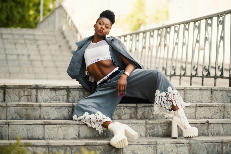 lifestyles, fashion, sit, style, young men, wear, beautiful, high heels, photoshoot, leisure activity, female, built structure, one person, hair, blazer