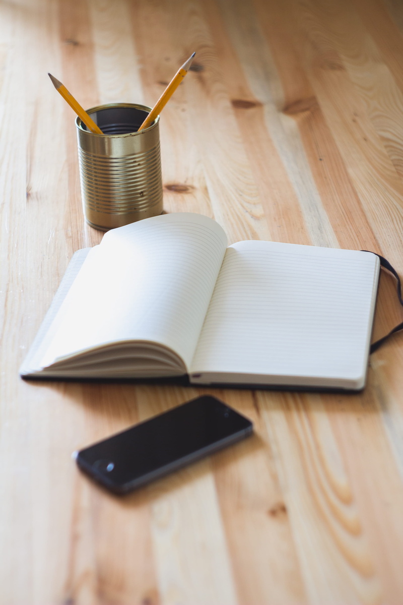cup, note pad, open, still life, close-up, food and drink, connection, publication, indoors, iphone, work, paper, education, pencil, no people, wood - material