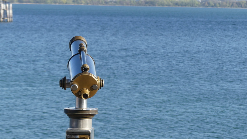 coin operated, travel, binoculars, blue, waters, metal, no people, spyglass, close-up, tranquil scene, nature, outdoors, focus on foreground, safety, water