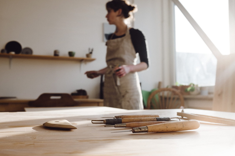 artist, pot, day, standing, handicraft, adult, ceramics, three quarter length, one person, creativity, clay, culture, concentration, making, workshop, pottery