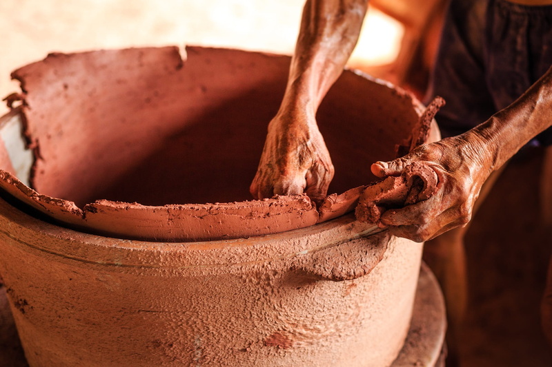 one person, hand, creativity, work, art, vietnam, the bottle, creation, holding, mature, do, making, woman, art and craft, workers, spin, neck, clay, adult