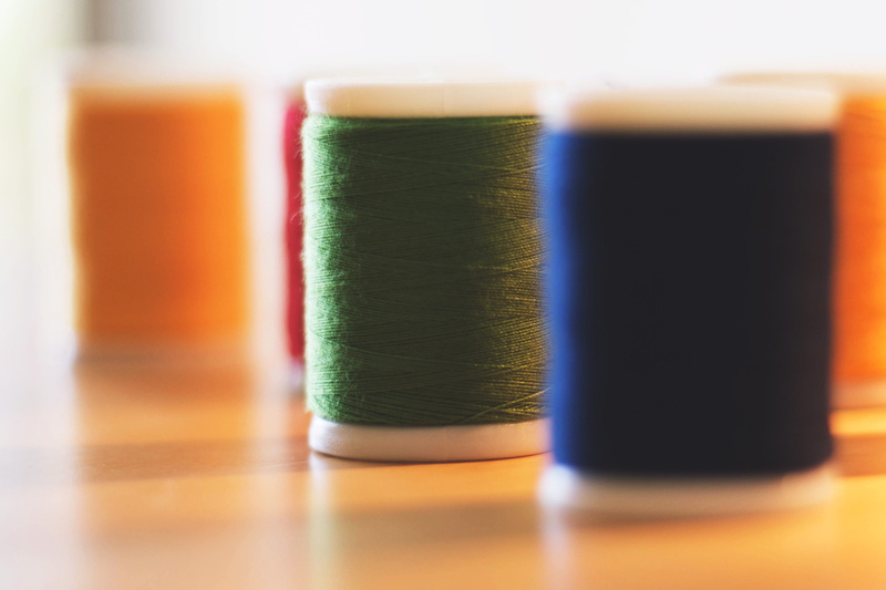 indoors, studio shot, in a row, clothes, reflection, wool, textile, clothing, Cotton, sewing Item, variation, order, blue, drink, multi Colored, food and drink