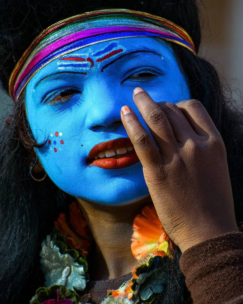 face paint, color, young women, hairstyle, people, human face, one person, adult, looking, nail, festival, indoors, paint, blue, close-up, mask, front view