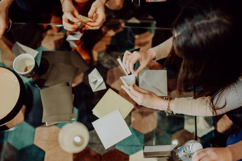 businesswoman, artwork, young women, high angle view, young adult, group of people, paper, adult, group, handmade, japan, sitting, making, people, creative