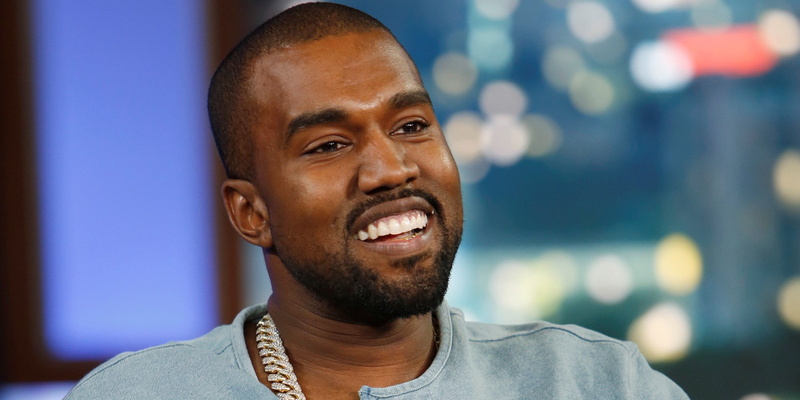 headshot, contemplation, smiling, hairstyle, mid adult, human face, beard, kanye west, casual clothing, portrait, indoors, focus on foreground, happiness