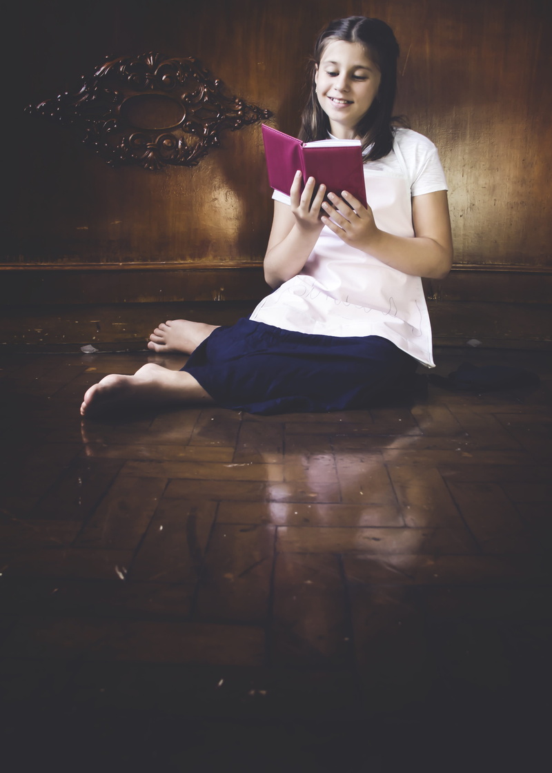 daughter, full length, child, ground, holding, indoors, wireless technology, girl, beautiful woman, female, portrait, real people, communication, studying