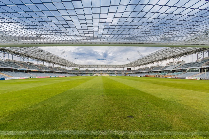game, no people, stadium, sport, soccer field, day, stadion, soccer, grass, field, daytime, bleachers, green color, built structure, sky, playing field