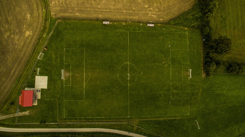 green, outdoors, game, built structure, green color, nature, land, judge, architecture, training, day, playing field, team sport, soccer, growth, no people