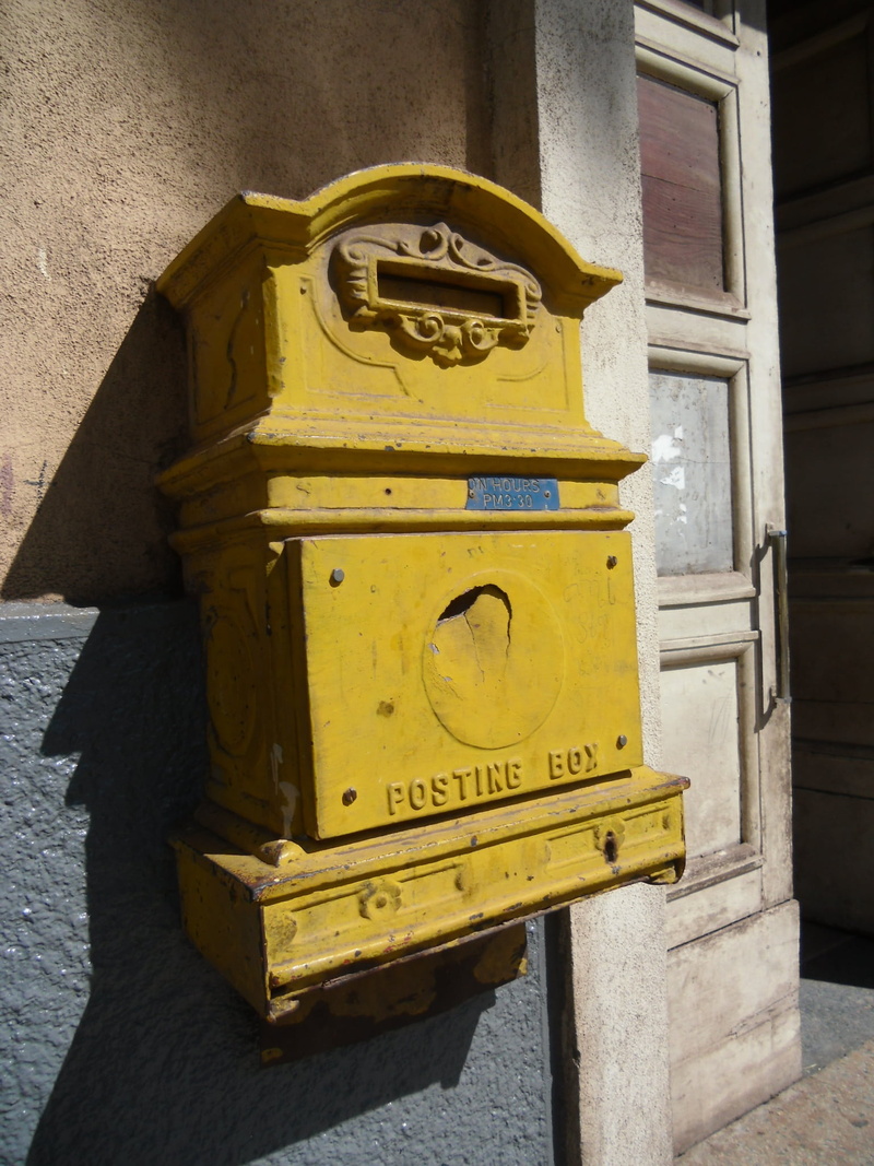 letter, correspondence, outdoors, built structure, no people, asmara, close-up, public mailbox, architecture, old, wall - building feature, text, building exterior