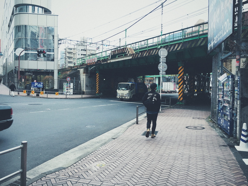 rail bridge, rear view, full length, city, city life, mode of transportation, city street, outdoors, lifestyles, land vehicle, architecture, shibuya, building exterior