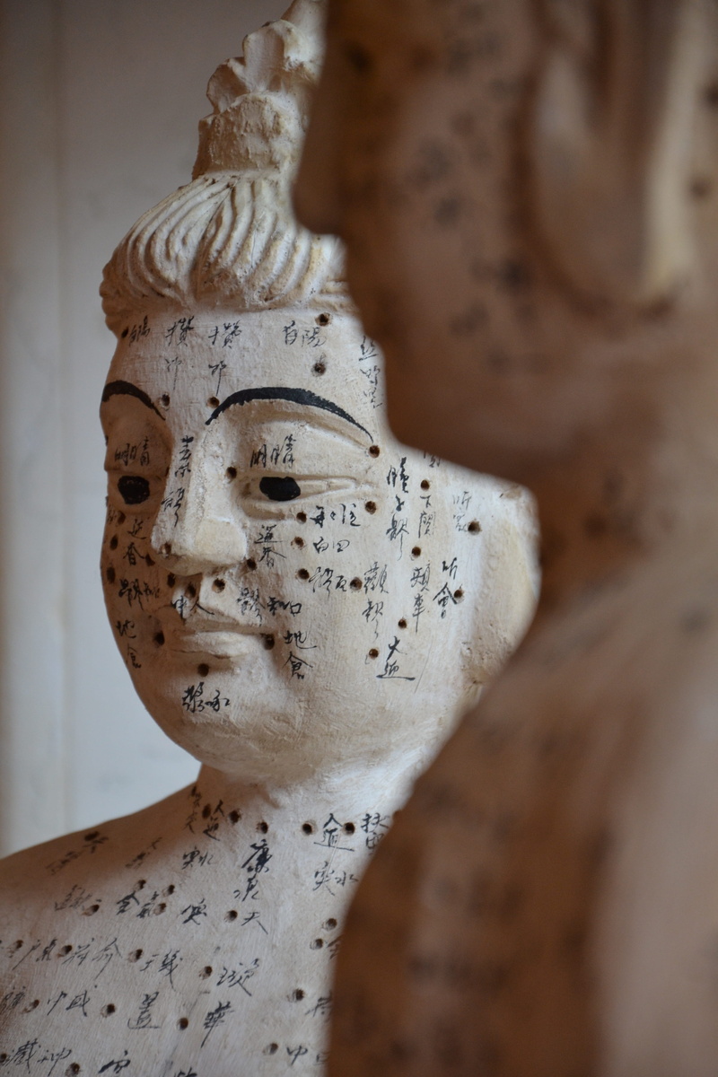 male likeness, tcm, chinese medicine, treatment, concrete, photography, indoors, focus on foreground, white, 4K, the past, naturopathy, art and craft