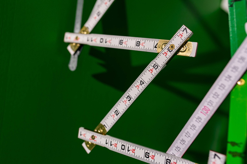 metal, western script, instrument of Measurement, ruler, wooden, close-up, no people, background, work tool, green color, still life, focus on foreground