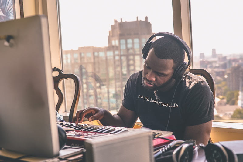 city, using, music, human, casual clothing, technology, men, day, 4K, headset, computer keyboard, window, person, man, monitor, adult, table, headphones