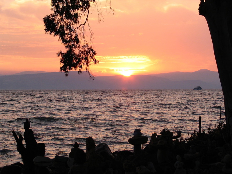 horizon over water, silhouette, tranquil scene, israel, sunset, nature, tranquility, sea, men, orange color, outdoors, sea of galilee, water, group of people