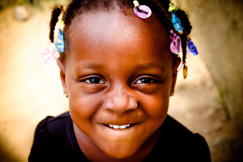 african child, one person, girl, 2K, cheerful, eyes, soft, taking, body part, birth, hand, females, offspring, emotion, spontaneous, top, black skin, african girl