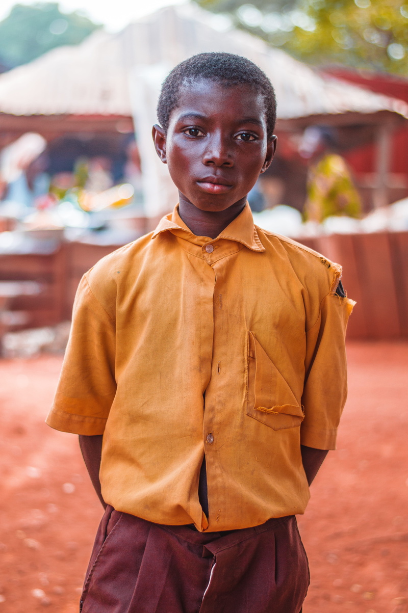 men, front view, three quarter length, expression, child, young, lifestyles, day, real people, ripped, look, ghana, childhood, portrait, stern, waist up