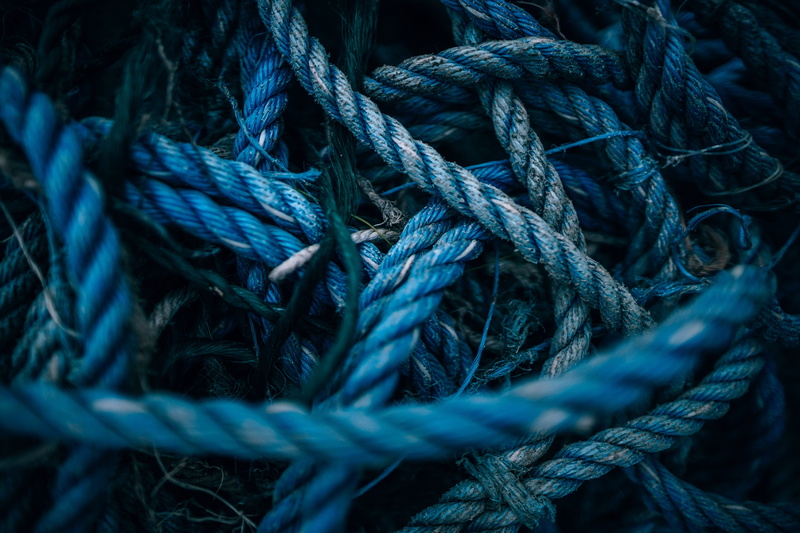 outdoors, net, equipment, rope, selective focus, tied knot, high angle view, tangled, tied up, string, blue, 5K, material, turquoise colored, detail, day