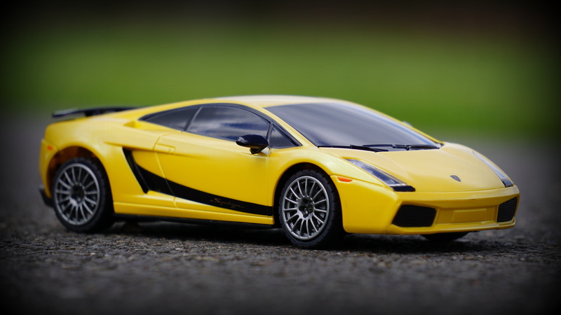 concrete, style, auto, motor, toy, yellow, taxi, sport, road, surface, vehicle, selective focus, technology, drive, supercar, sports car, personal land vehicle