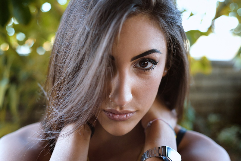nose rings, portrait, close-up, focus on foreground, young women, depth of field, smiling, hair, one person, 1080P, beauty, face, beautiful woman, looking at camera