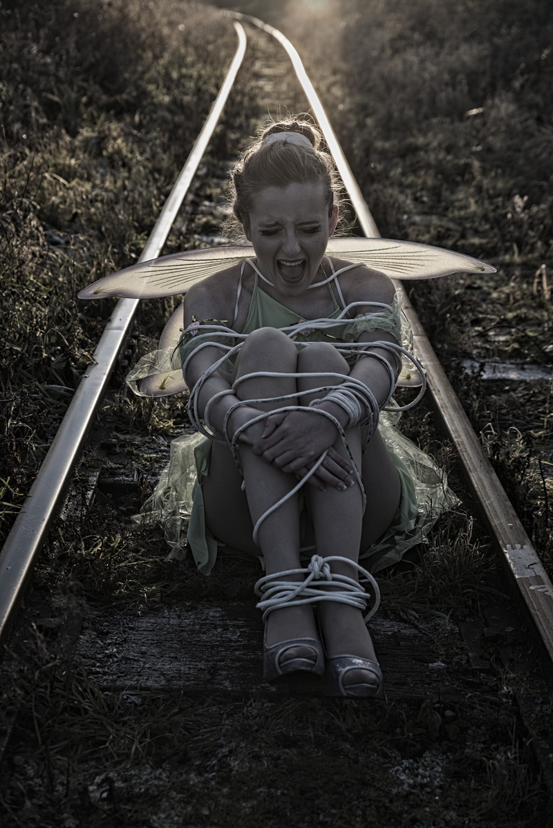 lifestyles, outdoors, woman, childhood, leisure activity, nature, imagination, casual clothing, females, fashion, face, land, track, adult, child, train