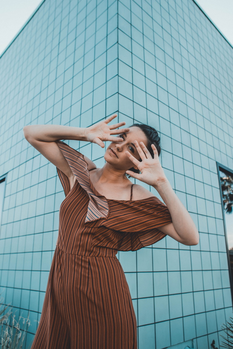 standing, girl, concrete, day, person, trendy, hands, young adult, adult, beauty, stripe, arms raised, daytime, hairstyle, pattern, 5K, women, urban, near