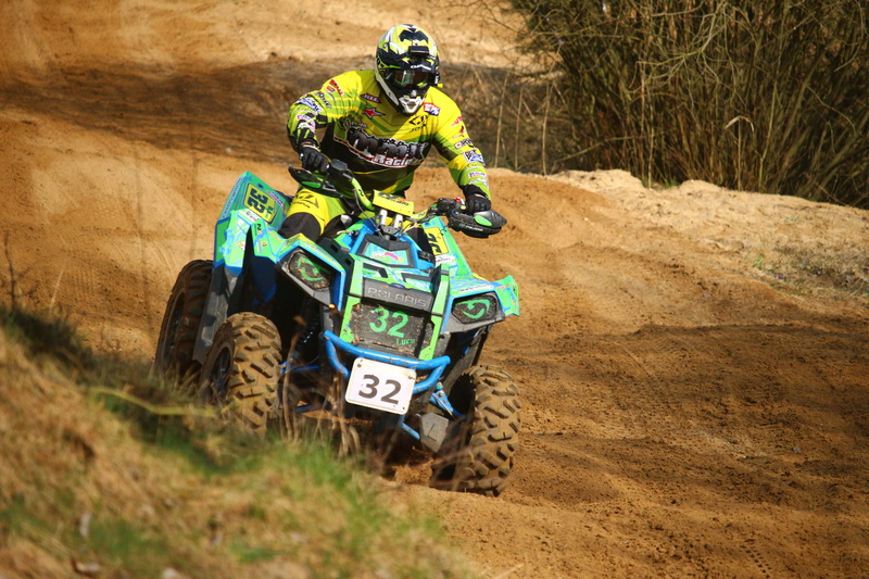 all-terrain vehicle, sports track, competition, headwear, quad, riding, motorcycle Racing, race, day, speed, person, sand, adventure, real people, one person