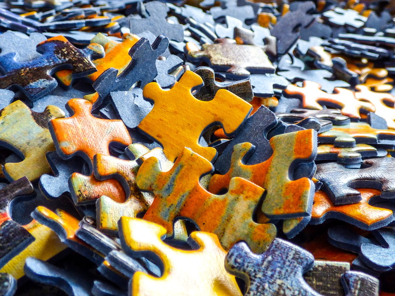 game, jigsaw piece, jigsaw, connection, lot, shape, still life, close-up, indoors, jigsaw puzzle, orange color, puzzle, logic, large group of objects, snack