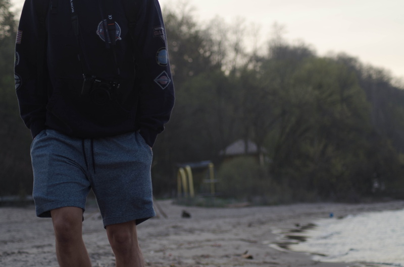 streetwear, plant, rear view, outdoors, portrait, midsection, focus on foreground, nature, casual clothing, clothing, 4K, minimal, united states, beach