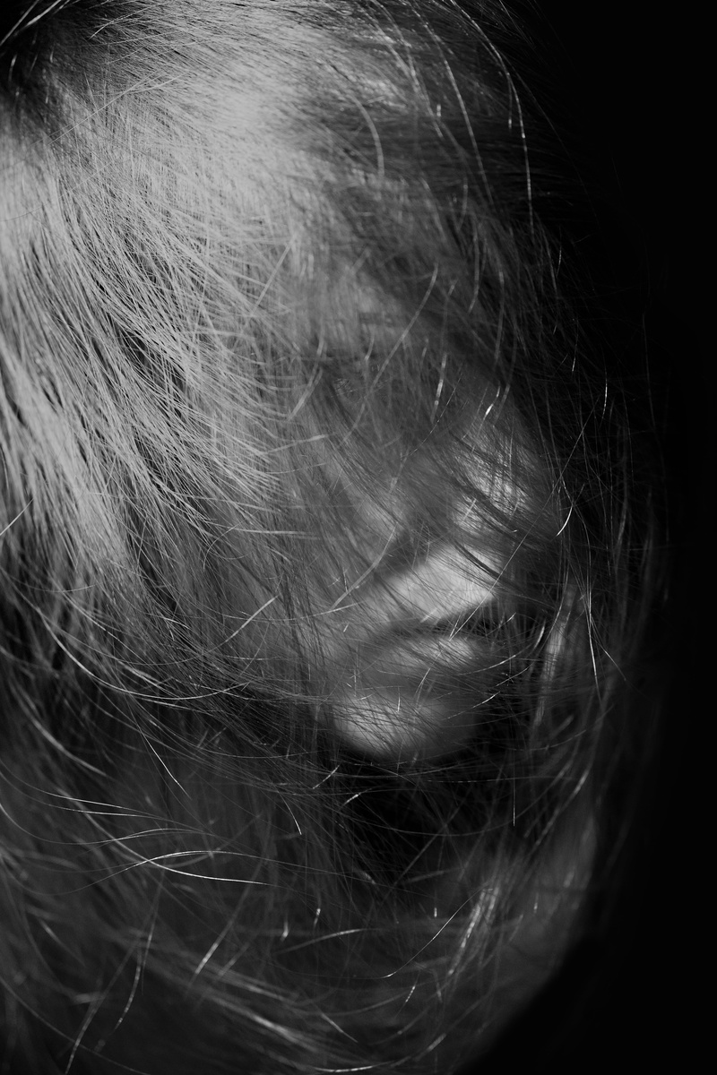 indoors, adults only, design, human ear, grayscale, studio, loneliness, beautiful, lifestyles, the young woman, human, close-up, young, adult, long hair