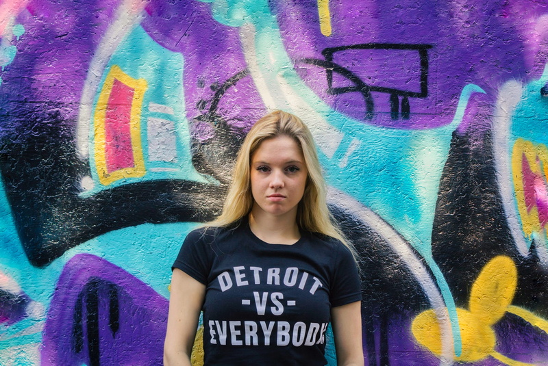 lifestyles, colors, female, young adult, brand, looking at camera, color, beautiful woman, 1080P, young women, purple, wall - building feature, grafitti