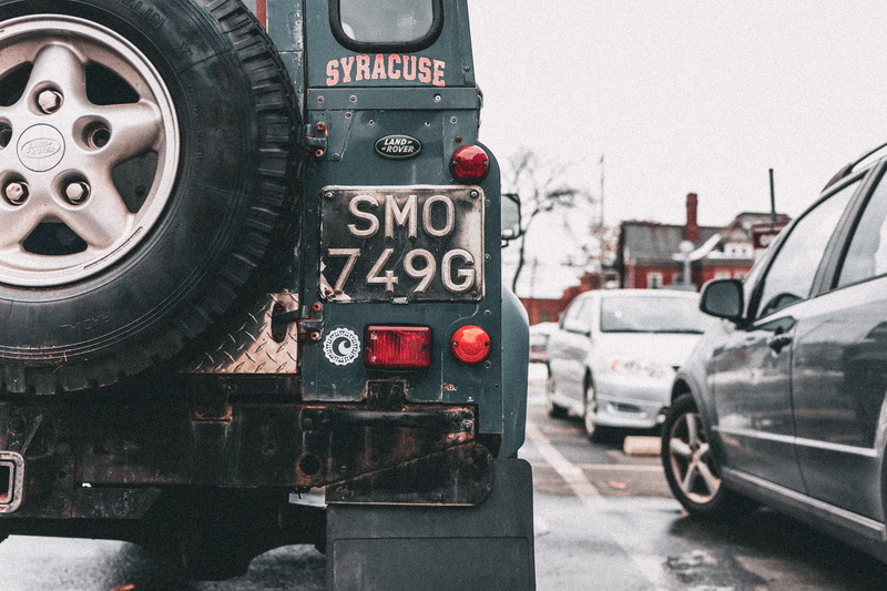 land rover, white, close-up, parks, parking lot, architecture, vehicle, connection, tire, red light, old school, automobiles, headlights, day, road, communication