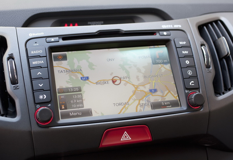 indoors, technology, land vehicle, vehicle interior, close-up, glass - material, transportation, map, motor vehicle, control panel, driving, sportage, screen