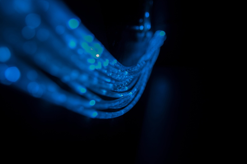 motion, finger, night, blue, adult, pattern, human body part, illuminated, nightlife, black background, backgrounds, close-up, hand, futuristic, technology