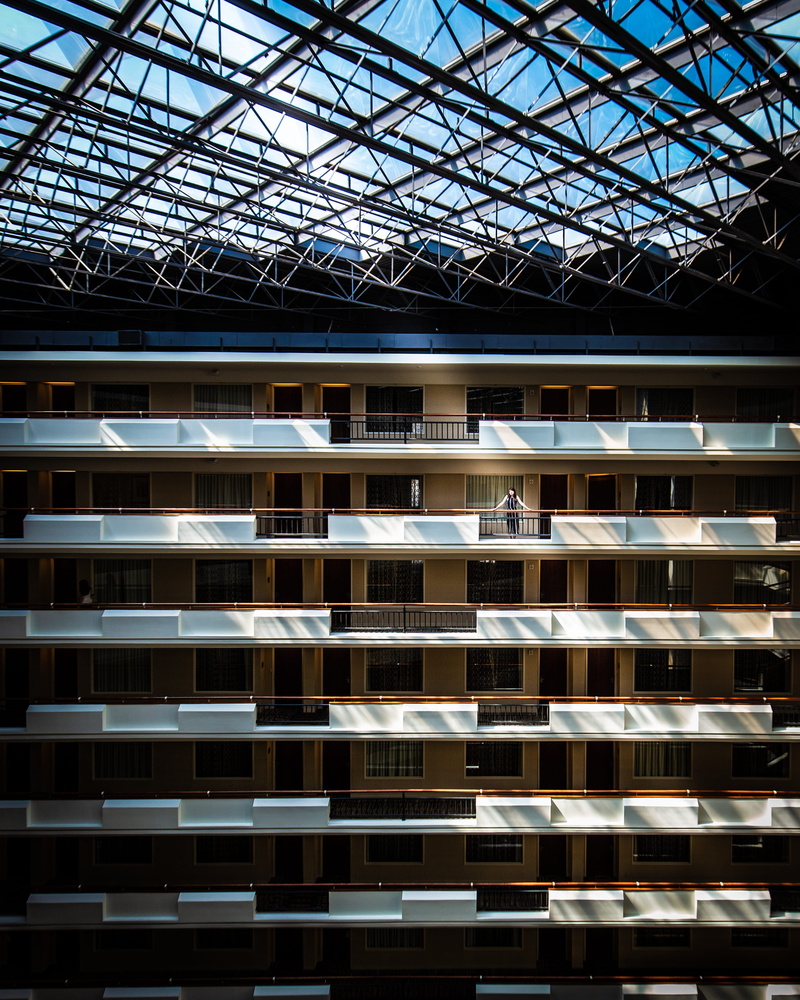 balcony, skylight, no people, levels, modern, low angle view, outdoors, concrete, building exterior, tall - high, office building exterior, railing, architectural feature