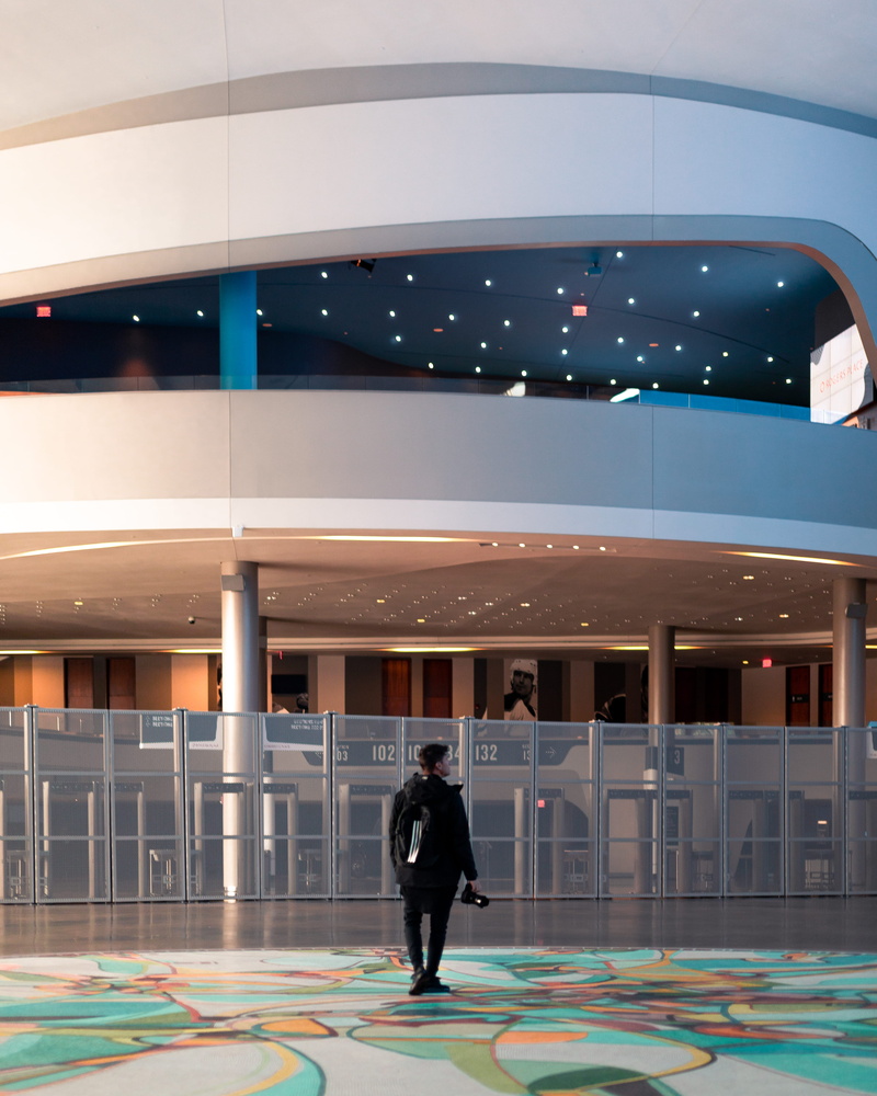 built structure, walking, person, real people, casual clothing, lobby, illuminated, standing, art, 4K, room, lifestyles, glass, full length, outdoors