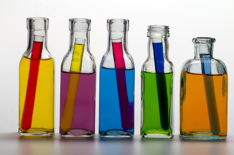 food and drink, bottles, multi colored, indoors, alcohol, color, farbenspiel, in a row, transparent, five, test tubes, clear, side by side, arrangement