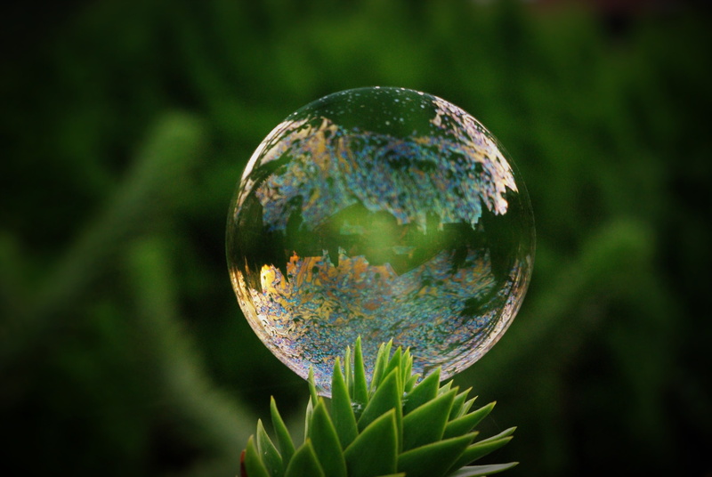 earth, fragility, single object, airy, colorful, glass - material, close-up, bright, planet - Space, green, transparent, focus on foreground, reflection