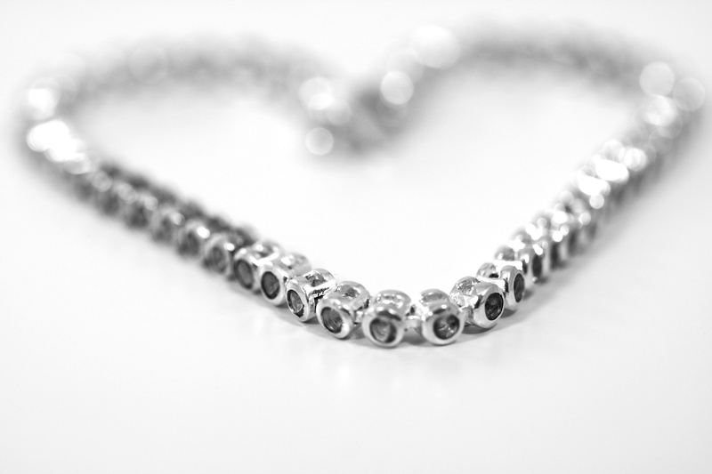 no people, indoors, beauty, heart shape, diamond, personal Accessory, love, shape, precious gem, white, silver colored, diamond - gemstone, pearl jewelry