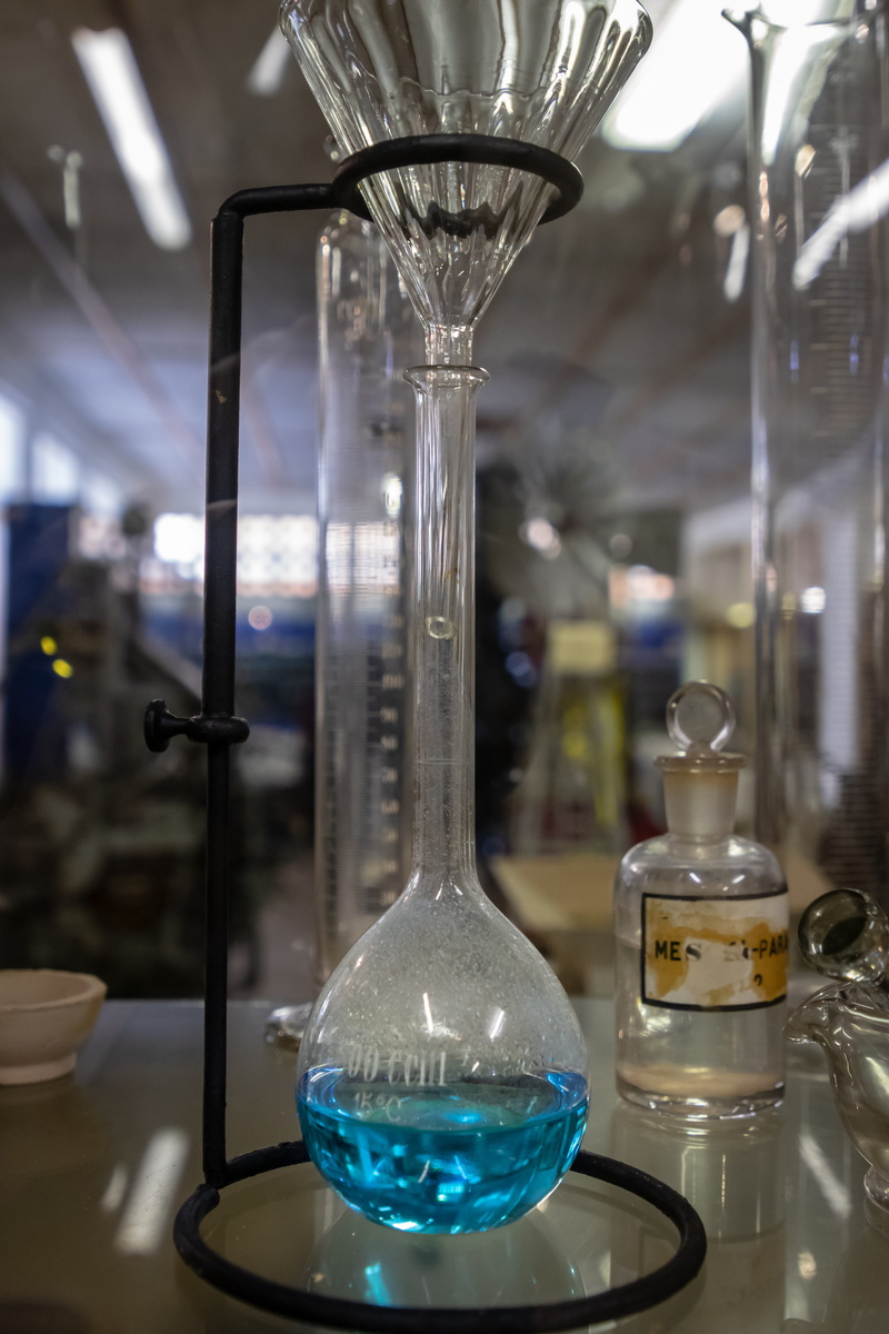 beaker, still life, perfume, factory, china cabinet, science, pop bottle, cabinet, lamp, crystal, furniture, lab, glass - material, no people, laboratory