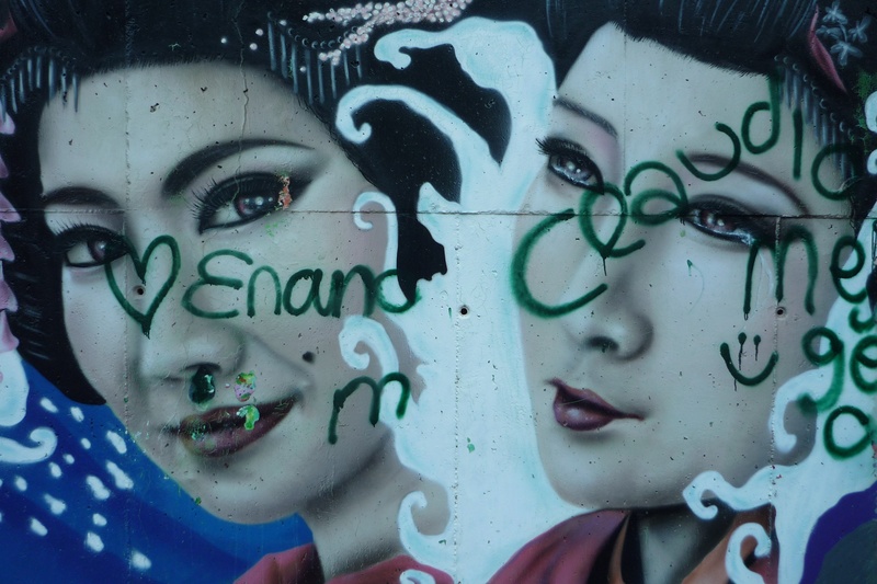 young adult, human representation, representation, green color, full frame, communication, text, colors, deterioration, spoiled, one person, women, graffiti