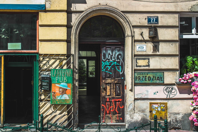 outdoors, window, shadow, open, shop, wall - building feature, multi colored, creativity, built structure, glass - material, pub, sign, bar, wooden, restaurant