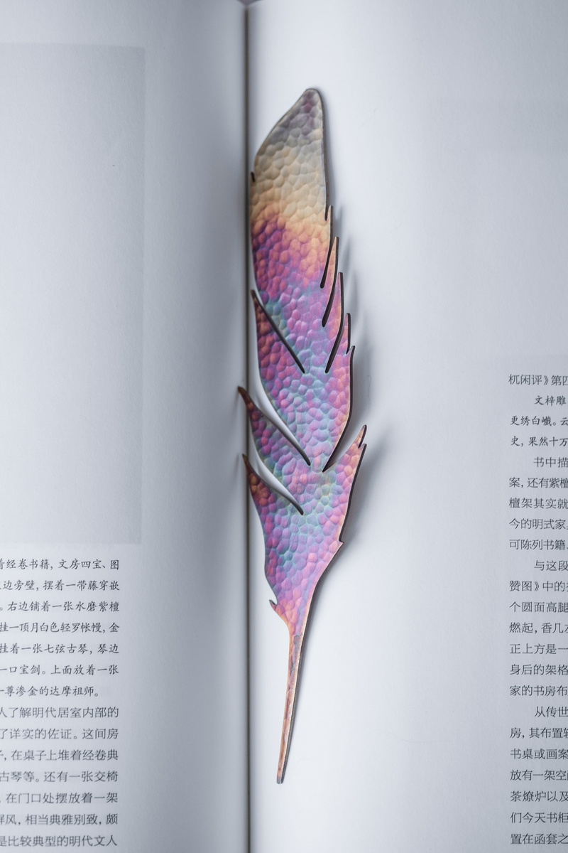 books, book, decorative, asian, communication, indoors, studio shot, copper, multi colored, guangzhou, close-up, design, minimal, paper, bookmark, text