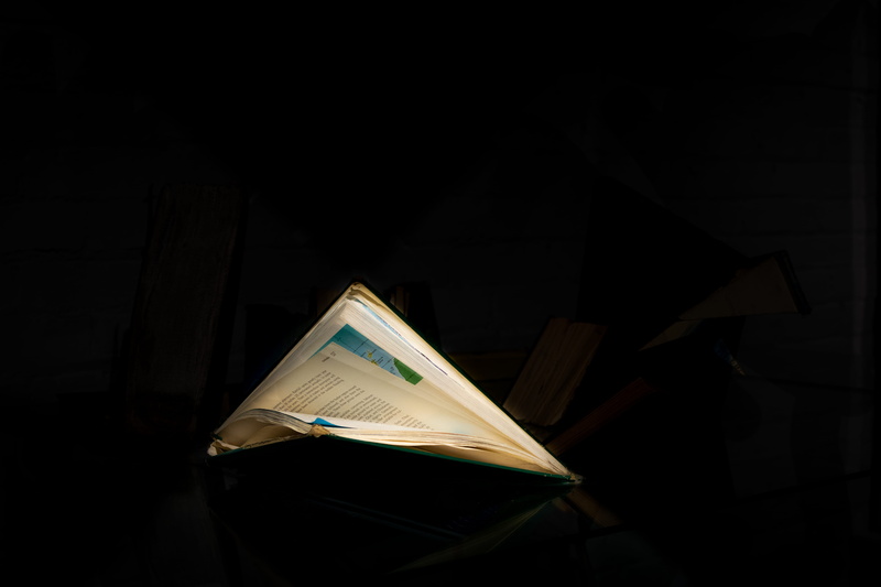 absence, newspaper, copy space, table, single object, night, shadow, postal office, desk, paper, brochure, page, close-up, advertisement, tabletop, text