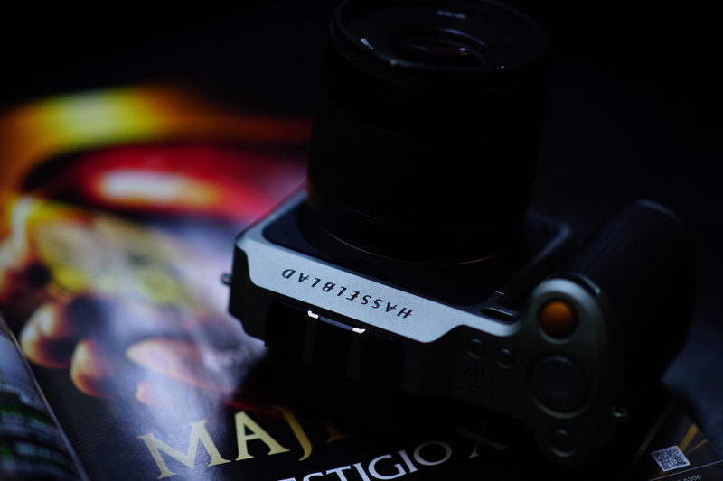 focus on foreground, camera, black, camera - photographic equipment, lcd screen, white, selective focus, lens cap, text, lens - optical instrument, film industry