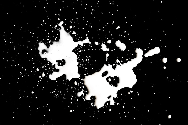 splat, indoors, water, wet, milk, 4K, stain, night, black, body part, close-up, black background, white, art and craft, texture, creativity, spots, paint