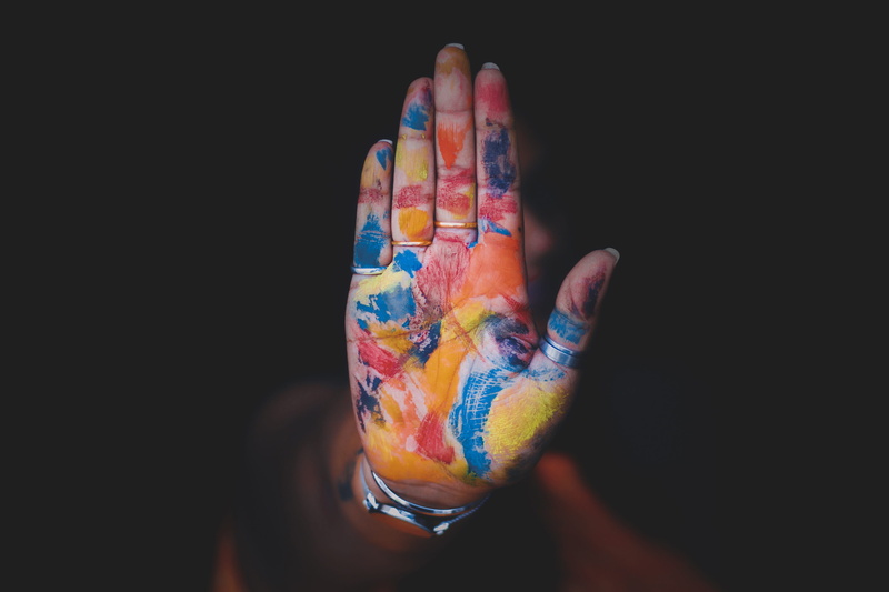 human arm, paint, 4K, human finger, human hand, black background, filled, copy space, one person, unrecognizable person, person, limb, adult