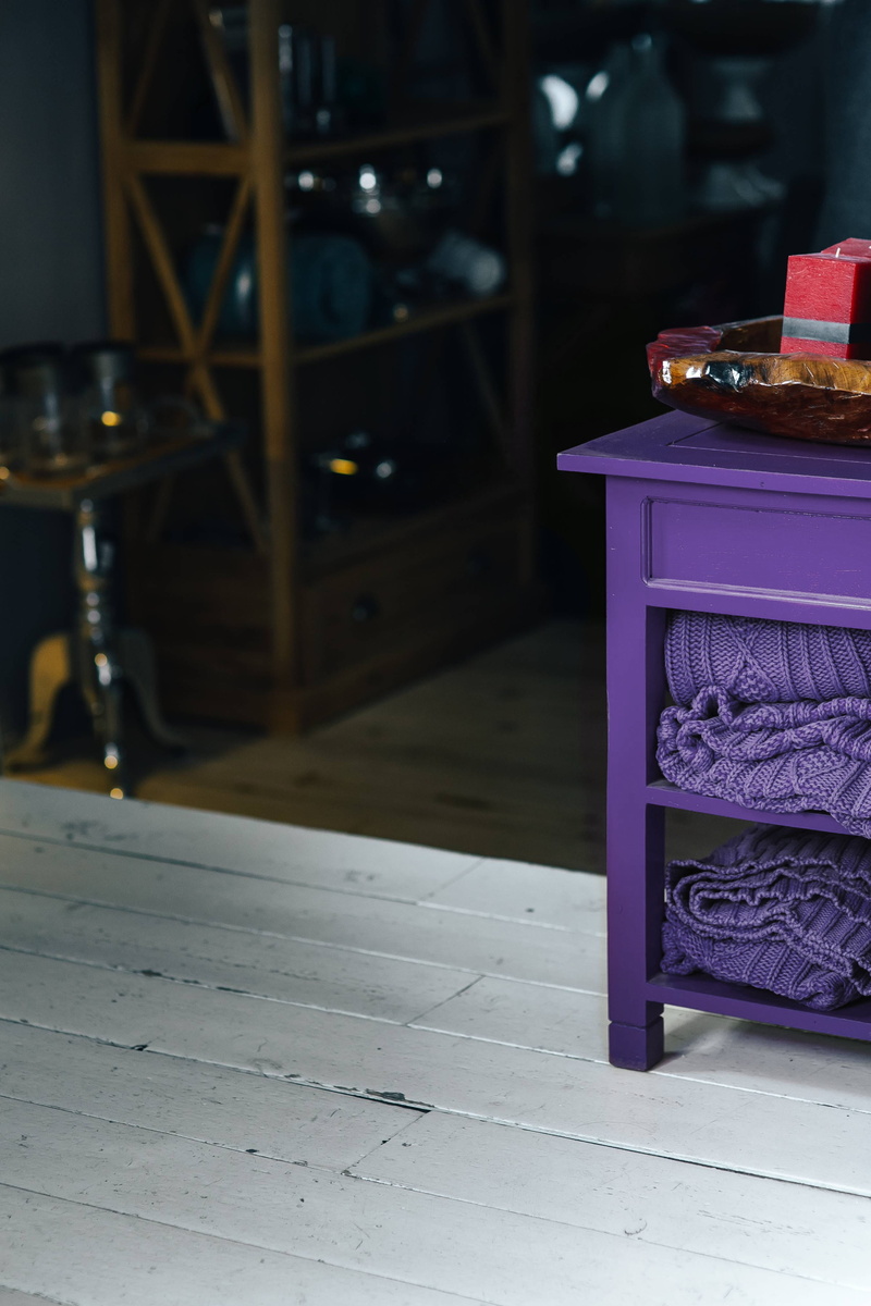 publication, focus on foreground, drink, food and drink, tiled floor, no people, stack, colour of the year, store, refreshment, table, violet, box - container